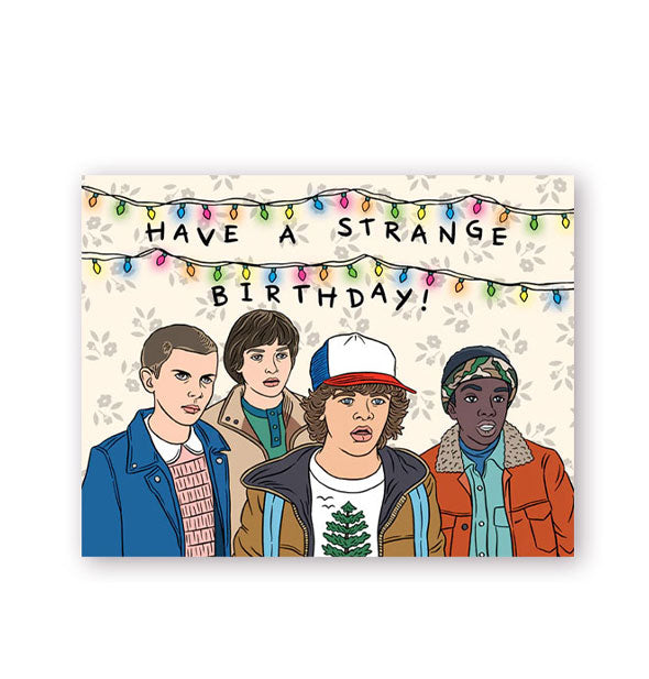 Birthday card featuring illustration of the main characters of Stranger Things below colorful string lights says, "Have a strange birthday!"