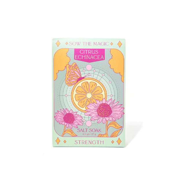 Packet of Citrus Echinacea Salt Soak with tarot-themed "Strength" design and illustration of an orange slice surrounded by radiall lines, flowers, a butterfly, and clouds