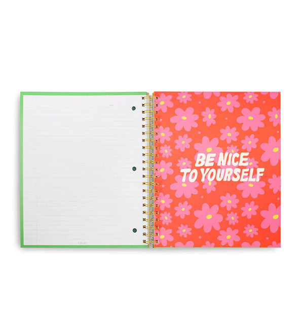 Opened notebook features a white lined page opposite a daisy print red, pink, and yellow page that says, "Be Nice to Yourself" in white lettering