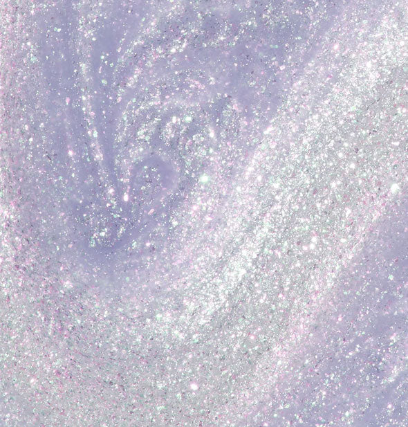 Closeup of shimmery pearlescent purple nail polish