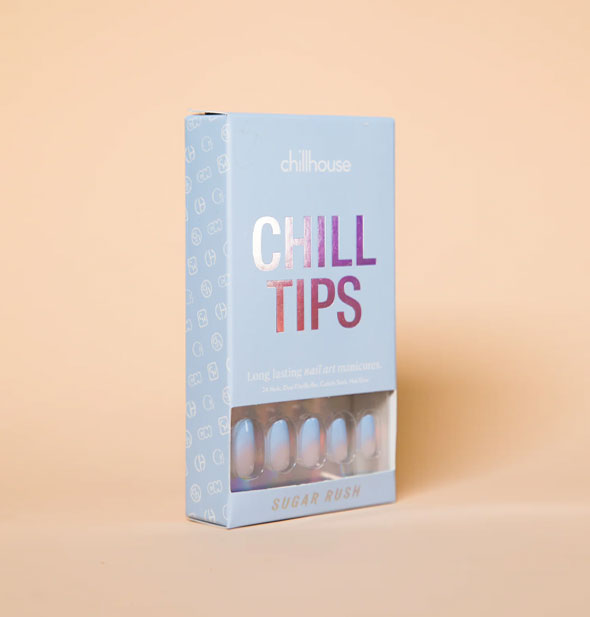 Light blue box of Chillhouse Chill Tips press-on nails in the style Sugar Rush, five of which are visible through a window in packaging