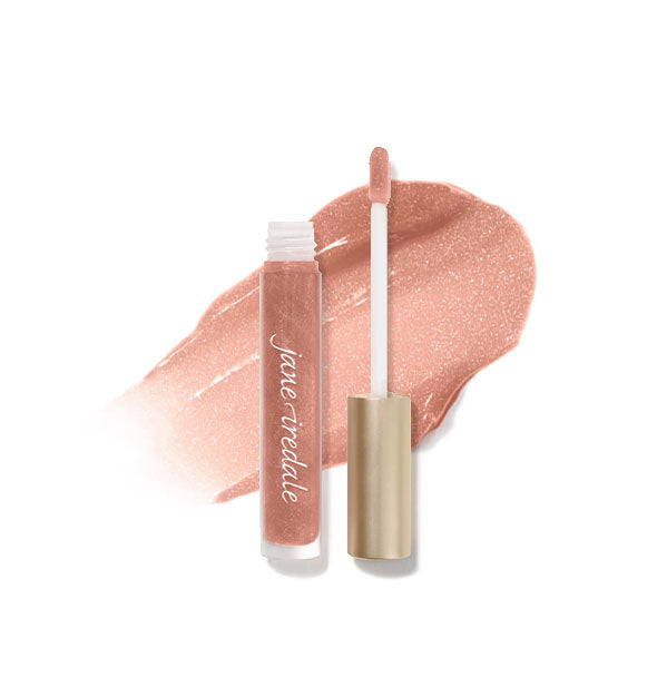 Tube of Jane Iredale HydroPure Hyaluronic Acid Lip Gloss with doe foot applicator cap removed and sample enlarged product application behind in shade Summer Peach