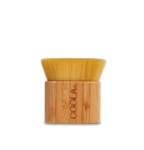 Wood-handled kabuki brush stamped with Coola logo