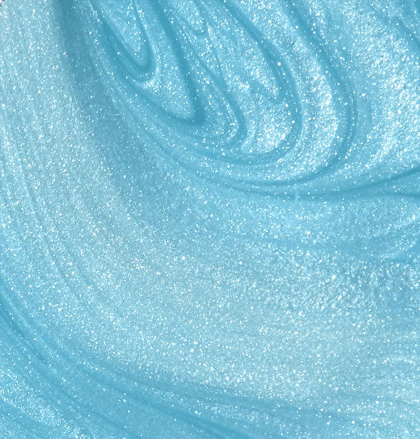 Closeup of shimmery blue nail polish