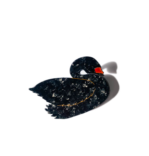 Quartz-effect black swan hair clip with gold edging and an orange beak