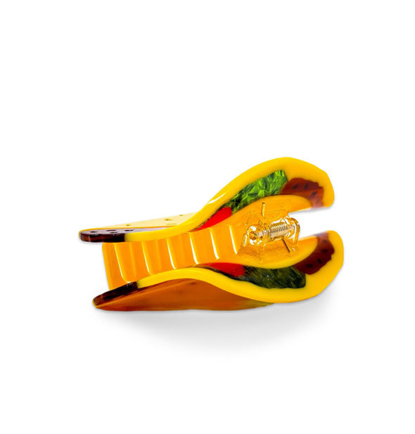 Hair clip designed to resemble a hard shell taco