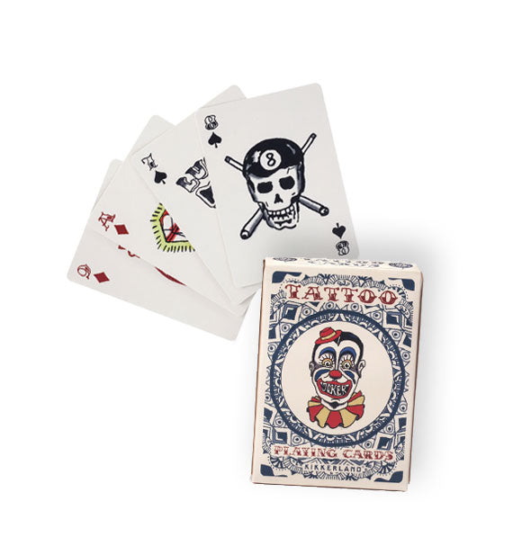 Box and sample hand of Tattoo Playing Cards, all featuring classic tattoo artwork