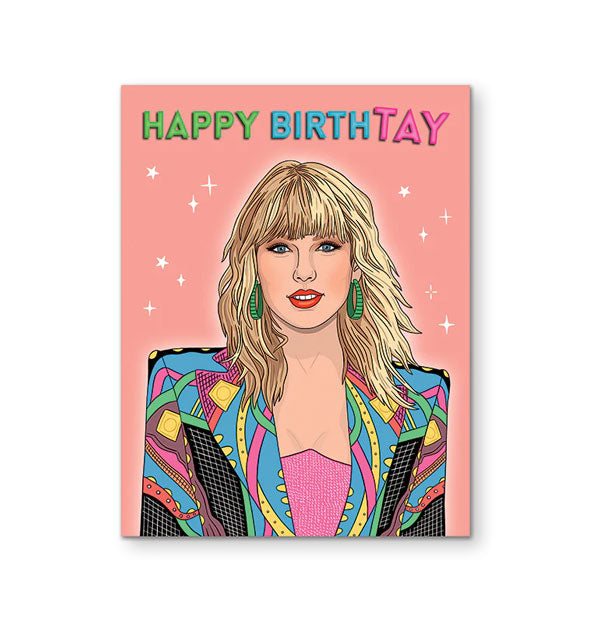 Pink greeting card with small white stars features illustration of Taylor Swift in a colorful jacket under the words, "Happy BirthTAY" in green, blue, and pink lettering