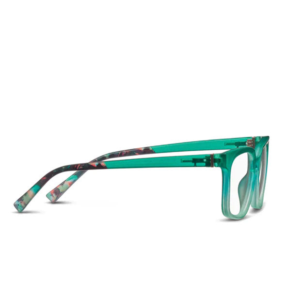 Pair of glasses with a teal ombre frame accented by brown and teal tortoise temple tips