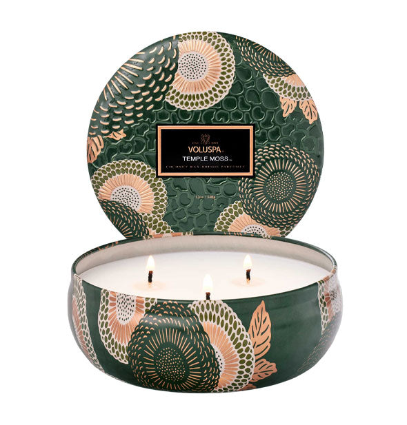Round, flat, 3-wick Voluspa Temple Moss candle tin and lid with decorative green, gold, and cream floral patterning