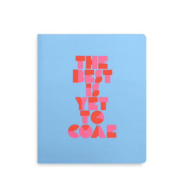 Blue planner cover says, "The best is yet to come" in two-tone pink and red lettering