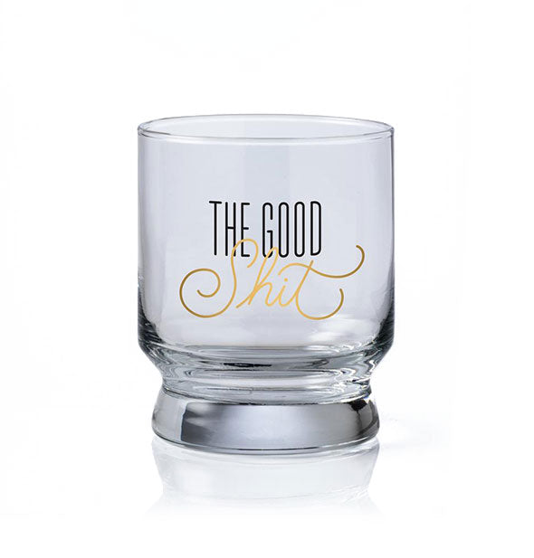 The Good Shit pedestal-shaped cocktail glass with black and gold foil lettering