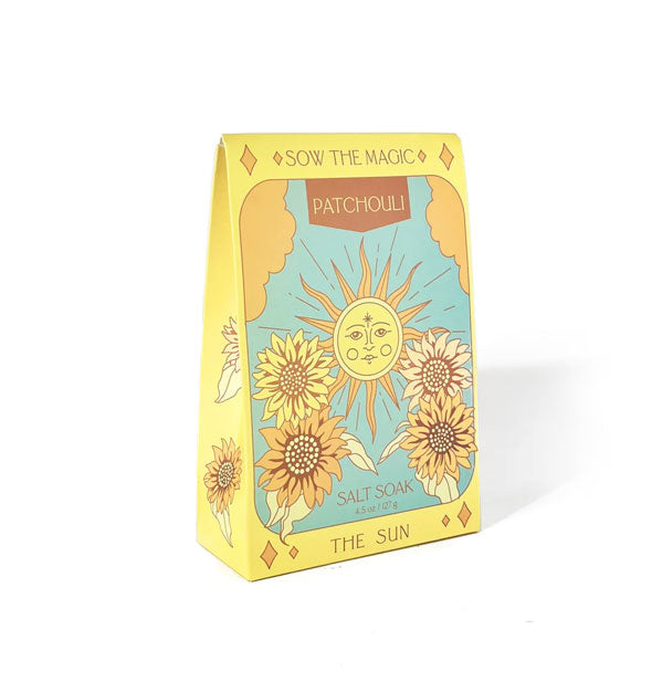 Yellow packet of Patchouli Salt Soak with The Sun tarot card-themed design