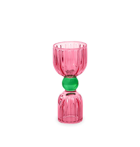 Two-tone pink and green faceted glass cocktail jigger with larger pink top, middle green sphere, and smaller bottom