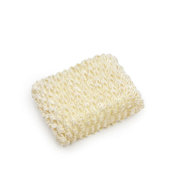 Dish sponge that resembles a block of dry, uncooked ramen noodles