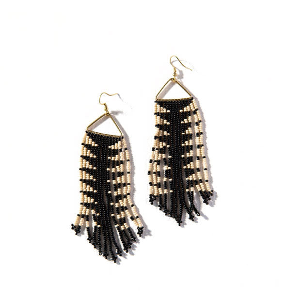 Pair of black and white triangle-print fringe dangle beadwork earrings on gold hardware