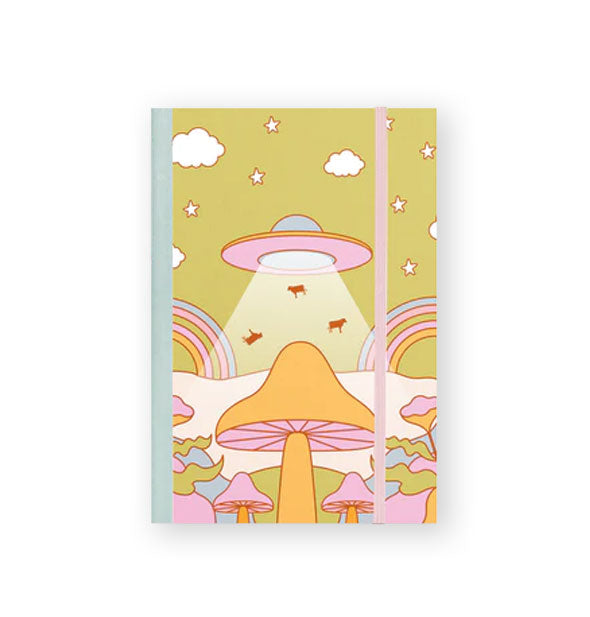 Notebook cover features a psychedelic scene of cows levitating into a spaceship's light beam in a sky with white clouds and stars above a field of mushrooms and rainbows