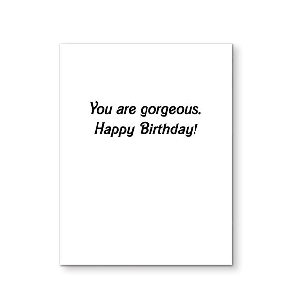 White greeting card interior says, "You are gorgeous. Happy Birthday!" in black Barbie logo lettering