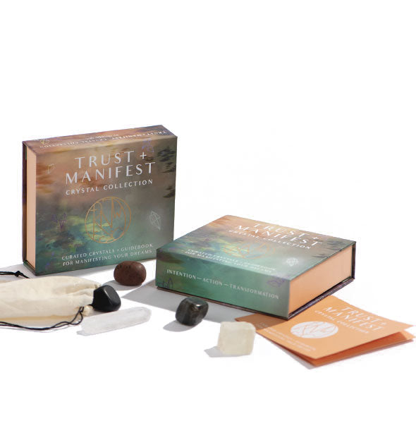 Gemstones, boxes, bag, and guidebook belonging to the Trust + Manifest Crystal Collection