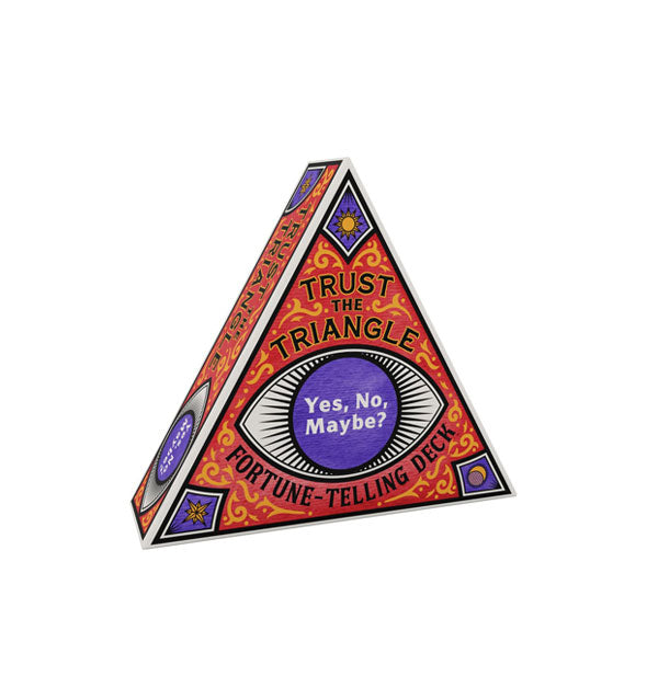 Triangular pack of Trust the Triangle: Yes, No, Maybe? Fortune-Telling cards with decorative purple, red, and gold design around a central eye shape