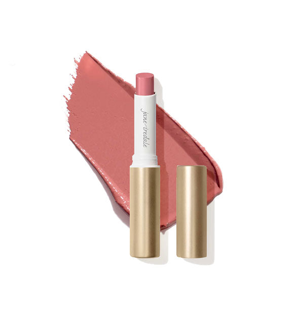 Opened tube of Jane Iredale ColorLuxe lipstick with color swatch behind, both in the medium rosy-pink shade Tutu