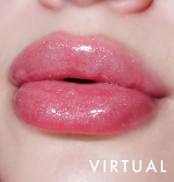 Closeup of model's lips wearing Kara Beauty Level Up! Nourishing Lip Gloss in Virtual orangey-pink shimmer