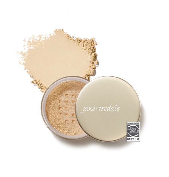 Opened compact of Jane Iredale Amazing Base Loose Mineral Powder and sample product swatch in shade Warm Silk with the Skin Cancer Foundation seal at lower right