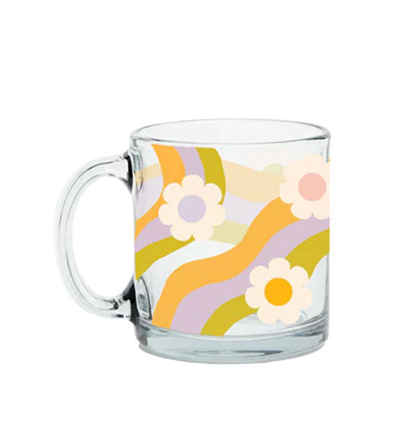 Clear glass mug with orange, periwinkle, and olive green wavy lines accented by daisies