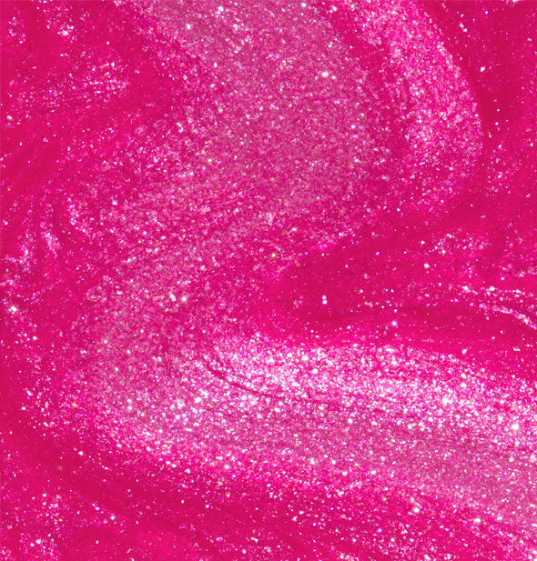 Closeup of shimmery magenta nail polish