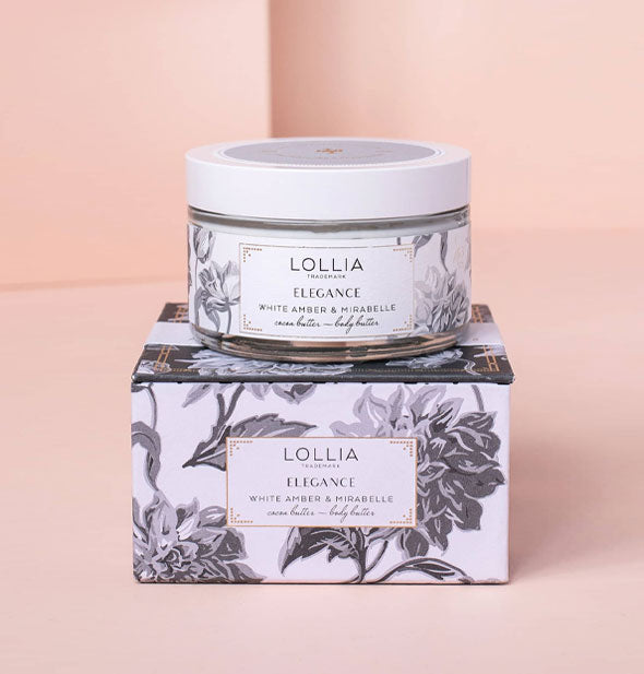 Box and jar of Lollia Elegance White Amber & Mirabelle Body Butter feature grayscale floral patterning