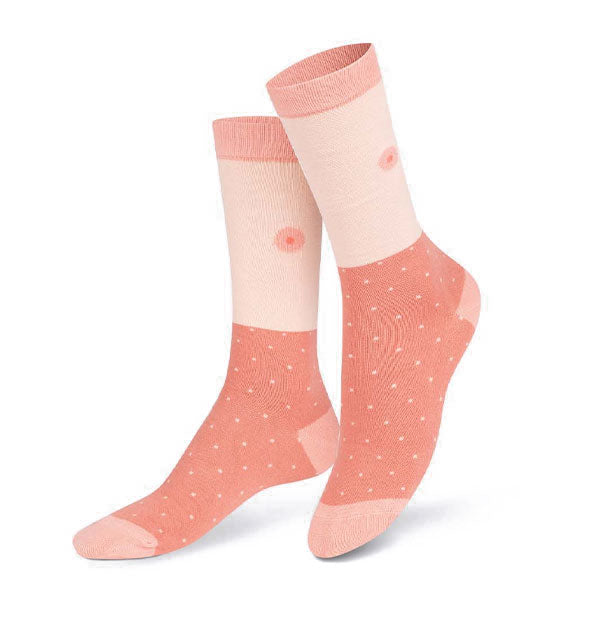 Pair of light-toned socks with small polkadot pattern on the bottom half and nipple accents above the ankles