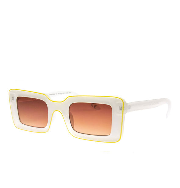 Pair of rectangular white sunglasses with a yellow pinstripe and amber lenses
