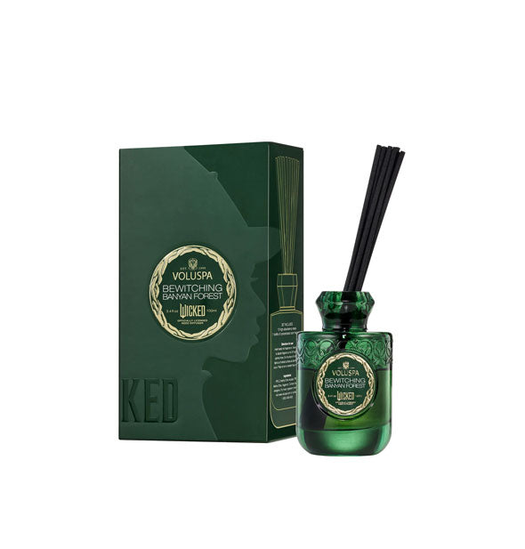 Embossed green glass Wicked Bewitching Banyan Forest Voluspa reed diffuser with matching box printed with Elphaba's silhouetted profile