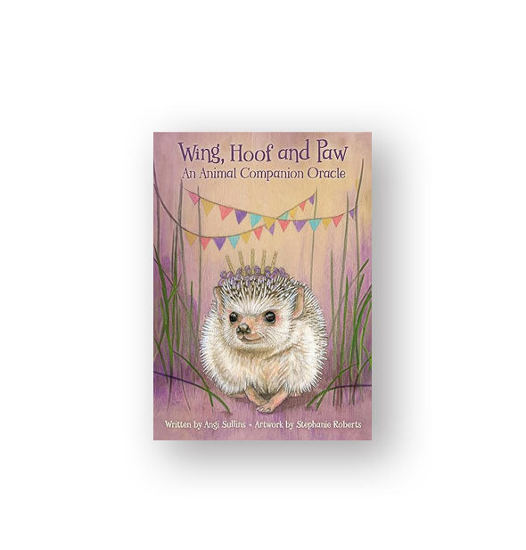 Wing, Hoof and Paw: An Animal Companion Oracle card deck box features whimsical illustration of a hedgehog underneath colorful pennant flag strings