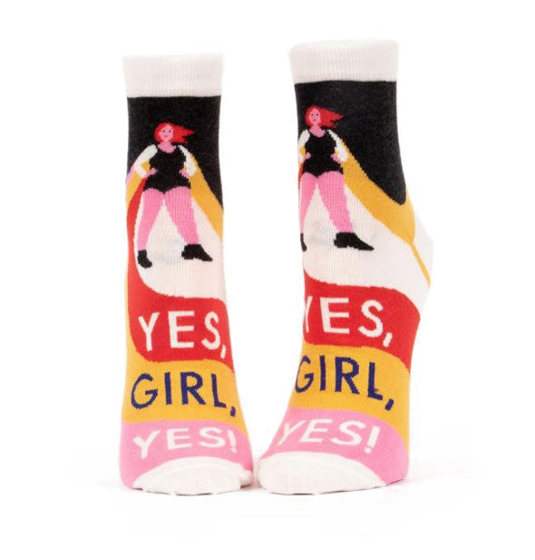 Socks featuring a woman standing with hands on hips say, "YES, GIRL, YES!"