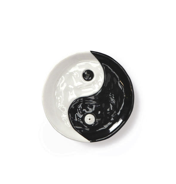 Round black and white yin yang incense dish
