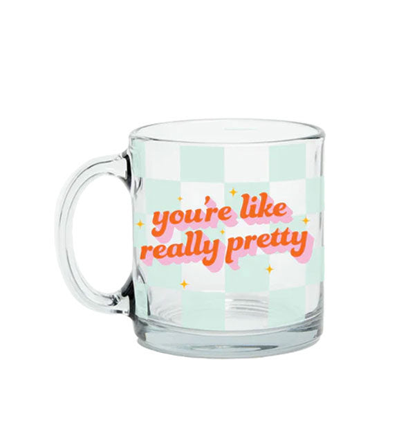 Clear glass mug with light aqua checker print says, "You're like really pretty" in red and pink lettering accented by small yellow stars