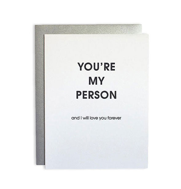 White greeting card with silver envelope behind says, "You're my person and I will love you forever" in black lettering