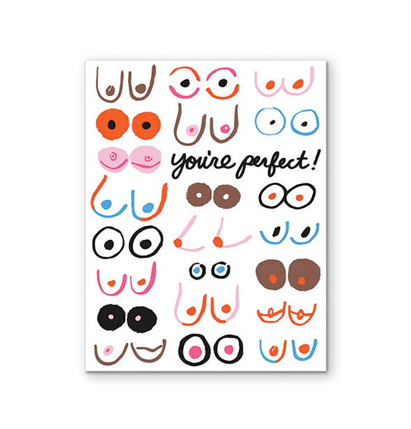 White greeting card featuring numerous colorful illustrations of breasts says, "You're perfect!" in the middle of them in black cursive letteirng