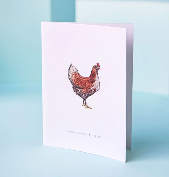 White greeting card with illustration of a chicken says, "Zero clucks to give"