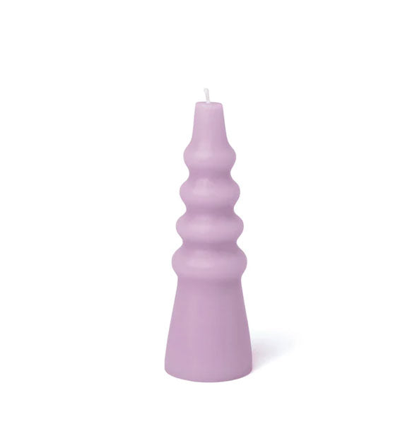 Conical purple candle with ribbed upper portion