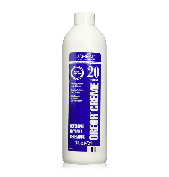 White and blue 16 ounce bottle of L'Oreal Oreor 20 Volume Creme Developer
