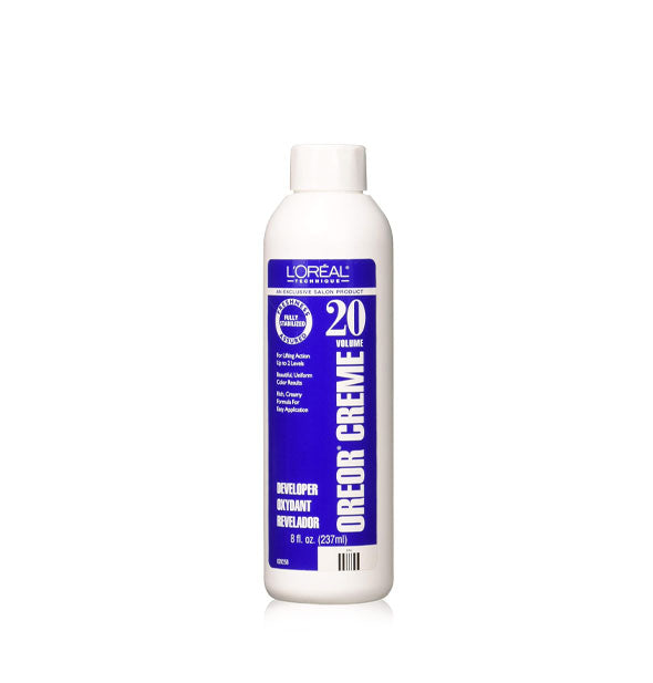 White and blue 8 ounce bottle of L'Oreal Oreor 20 Volume Creme Developer