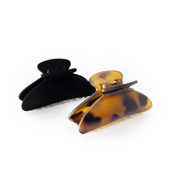 One black and one brown tortoise claw clip