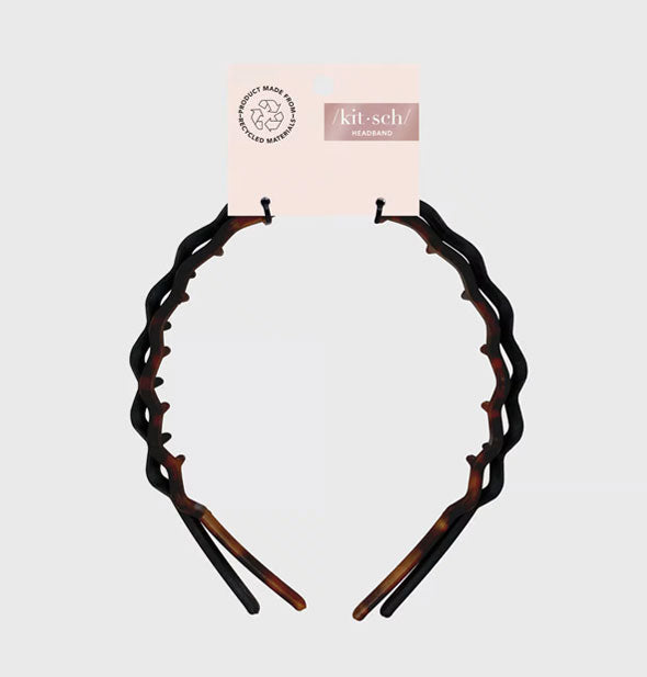Two zigzag headbands, black and brown tortoise, attached to a pale pink Kitsch product card which features a recycle infographic