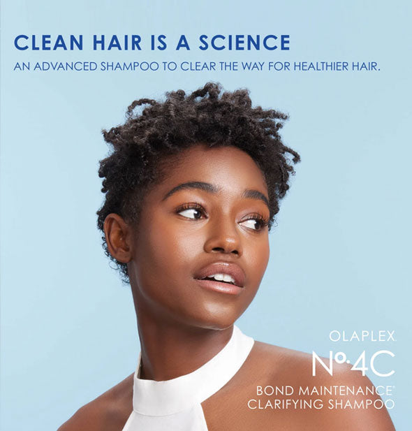 Image of a model with tightly coiled hair is captioned, "Clean hair is a science." Olaplex No. 4C Bond Maintenance Clarifying Shampoo is "an advanced shampoo to clear the way for healthier hair"
