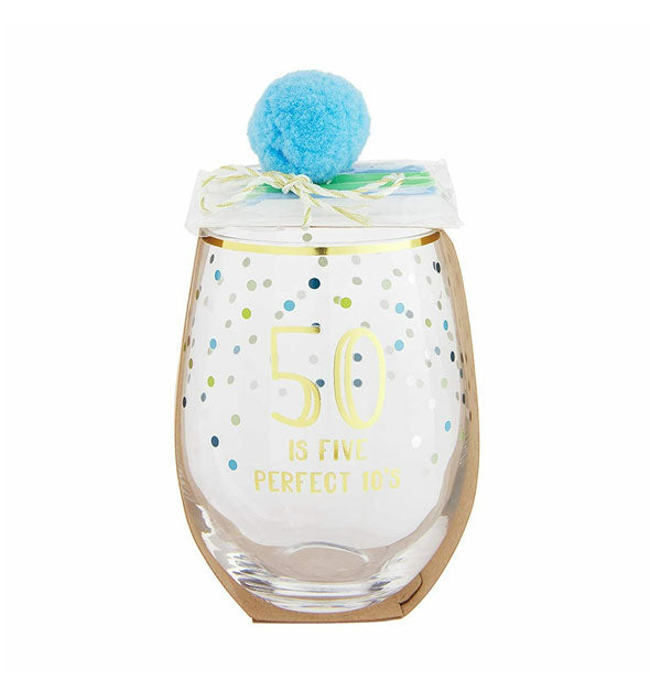 Stemless wine glass with gold rim, colorful confetti design, and blue pom pom with birthday candle pack attached says, "50 Is Five Perfect 10's" in gold foil lettering