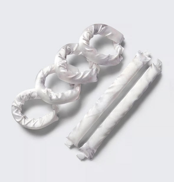 Contents of The Satin Pillow Roller set: six white rollers, four of which have ends joined together to form rings
