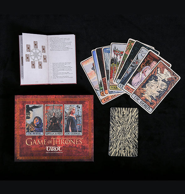 Spread from the Game of Thrones Tarot kit with card back, booklet, and box