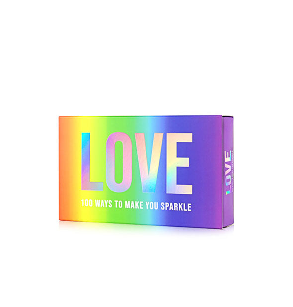 Rainbow-colored box of LOVE: 100 Ways to Make You Sparkle cards with holographic lettering